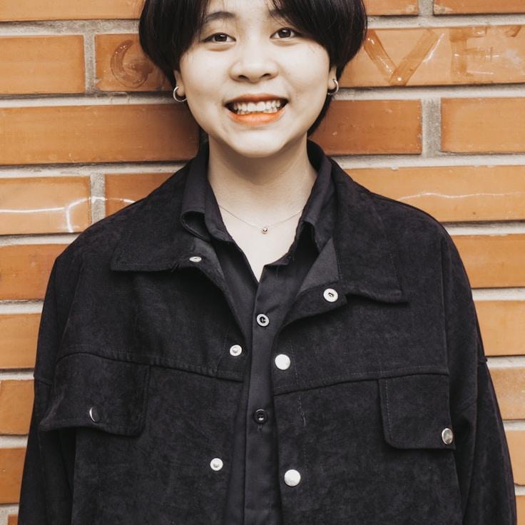 Aarav Singh, Lead Design Curator at Sunrise Harbor Platform, reviewing corporate floral arrangements